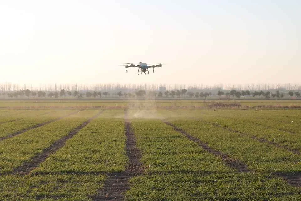JT-80 applying crop protection over a low crop